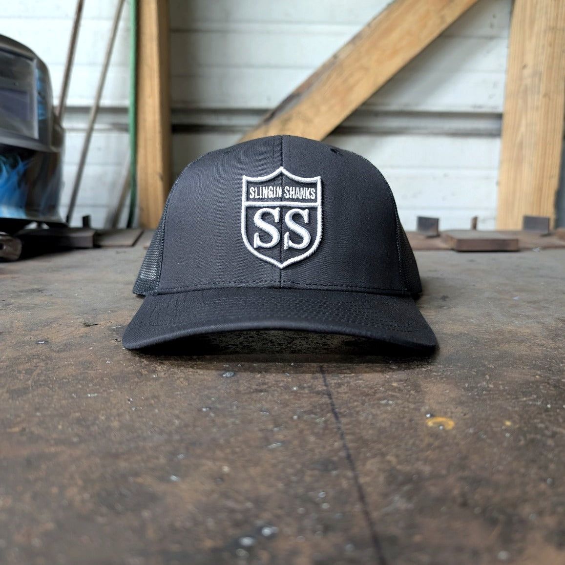 Slingin Shanks SS Shield trucker hat black front