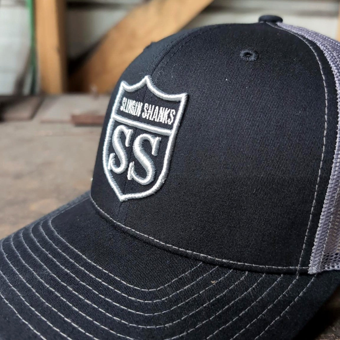 Slingin Shanks SS Shield trucker hat charcoal detail