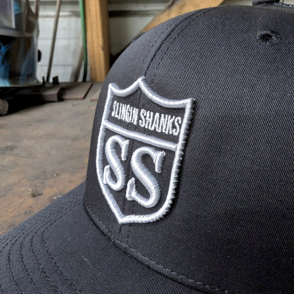 Slingin Shanks SS Shield trucker hat black detail