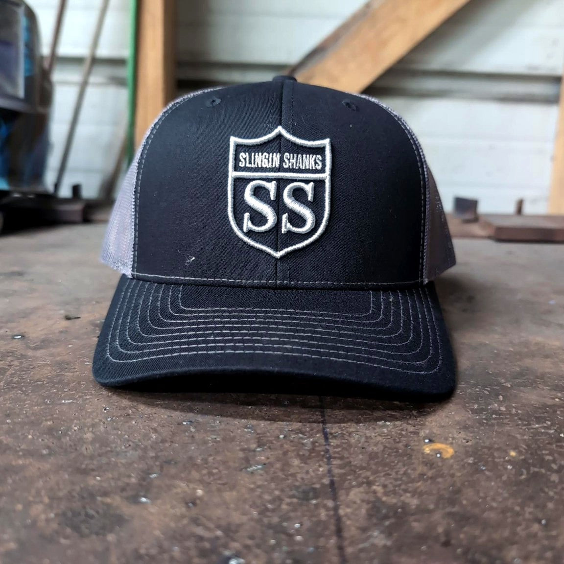 Slingin Shanks SS Shield trucker hat charcoal front