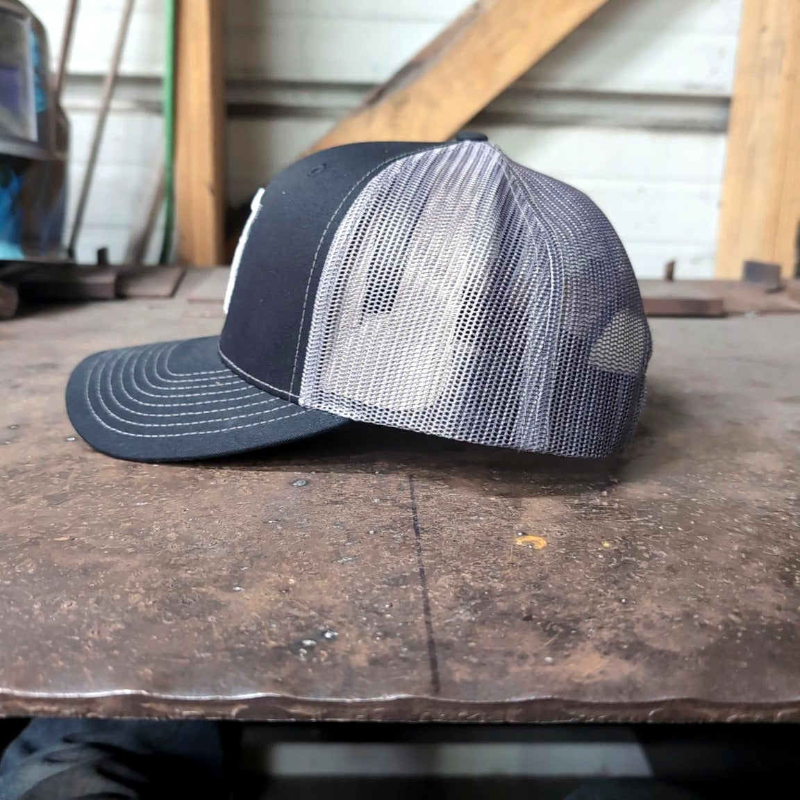 Slingin Shanks SS Shield trucker hat charcoal side